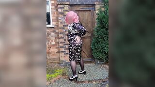 Pink haired crossdresser in sexy back satin dres