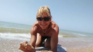 Alexa Cosmic shemale naked on the beach getting messy with sand and swimming in the sea...