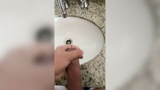broker enters the apartment, masturbates in front of the mirror and then cums in the sink!