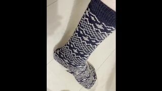 Mes pieds dans des chaussettes d'hiver