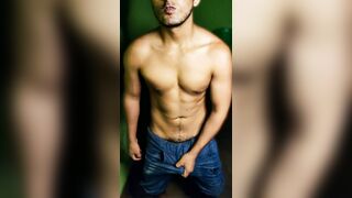 athletic boy stroking his cock