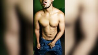 athletic boy stroking his cock