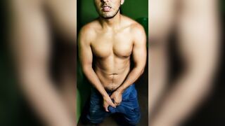 athletic boy stroking his cock