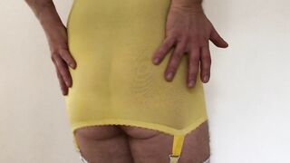 Urethra peeing in Vintage Girdle with Buttplug