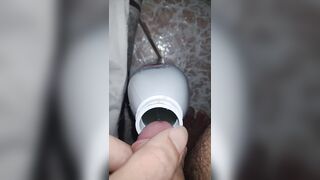 Pissing in milk bottle