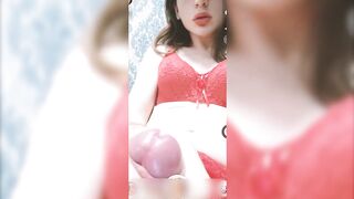 Tranny stepsis in red lingerie shows off her beautiful ass and cums for you