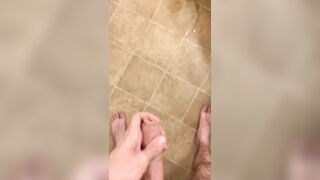 Hairy veiny uncut dick pissing with an erection on the bathroom floor