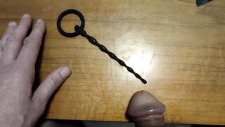 Urethral insertion with a small penis plug all the way in