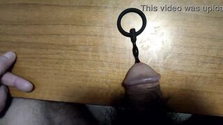 Urethral insertion with a small penis plug all the way in