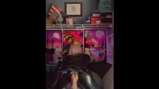 Sissy in Latex Catsuit Strokes and Shows Ass