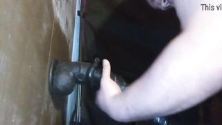 Chubby guy takes long black dildo using rockingchair