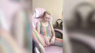 Petite boy in rainbow lingerie
