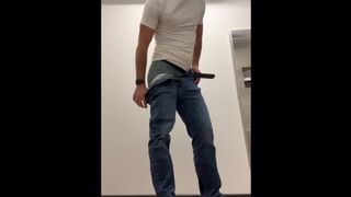 Pissing in a condom and pouring it on my face in public restroom - Slow motion