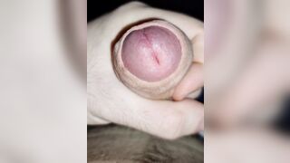 Teen jerks off his uncut cock and moans and whimpers