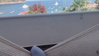 Hung guy stroking cock on hammock
