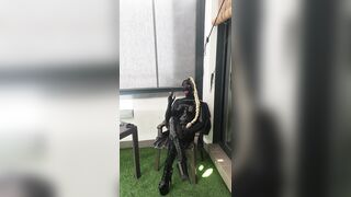 Latex Rubberdoll smoking