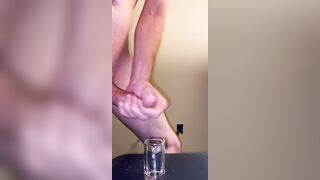 Dumping a load into a shot glass
