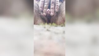 Big clit exhibitionist self fuck beside river