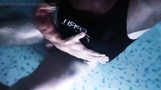 Sissy wearing Black one piece swimsuit on swimming pool