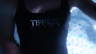 Sissy wearing Black one piece swimsuit on swimming pool