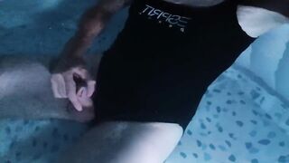 Sissy wearing Black one piece swimsuit on swimming pool