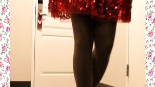 A 1950's SISSY DANCE FOR HER HUSBAND WEARING A PARTY DRESS