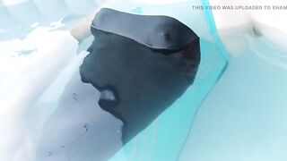 Shemale in sexy one piece swimsuit jerking in jaccuzzi