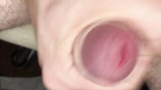 Close-up urethra, foreskin play, and jerking off to a creamy cumshot