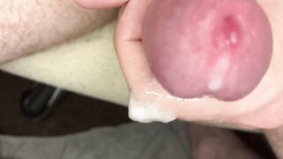Close-up urethra, foreskin play, and jerking off to a creamy cumshot