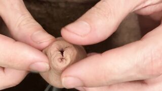 Close-up urethra, foreskin play, and jerking off to a creamy cumshot