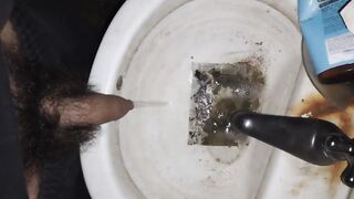 Hairy cock man pissing in old dirty sink