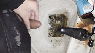 Hairy cock man pissing in old dirty sink