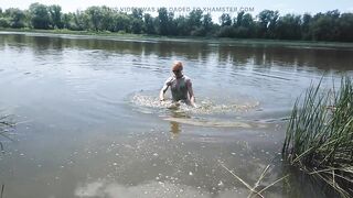 Alexa Cosmic transgirl swimming in clothes in river in jeans shirts and white t-shirt. Alexa Cosmic Wetlook Lover.