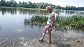 Alexa Cosmic transgirl swimming in clothes in river in jeans shirts and white t-shirt. Alexa Cosmic Wetlook Lover.