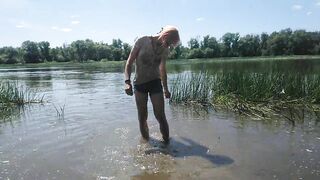 Alexa Cosmic transgirl swimming in clothes in river in jeans shirts and white t-shirt. Alexa Cosmic Wetlook Lover.