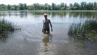 Alexa Cosmic transgirl swimming in clothes in river in jeans shirts and white t-shirt. Alexa Cosmic Wetlook Lover.
