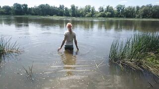 Alexa Cosmic transgirl swimming in clothes in river in jeans shirts and white t-shirt. Alexa Cosmic Wetlook Lover.