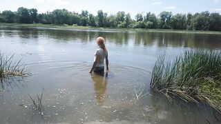 Alexa Cosmic transgirl swimming in clothes in river in jeans shirts and white t-shirt. Alexa Cosmic Wetlook Lover.