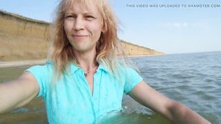 Alexa Cosmic transgirl swimming in the sea first time in teal combi dress