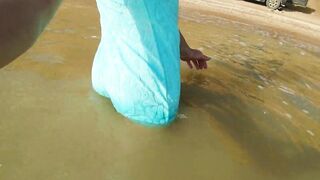 Alexa Cosmic transgirl swimming in the sea first time in teal combi dress
