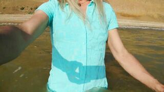 Alexa Cosmic transgirl swimming in the sea first time in teal combi dress